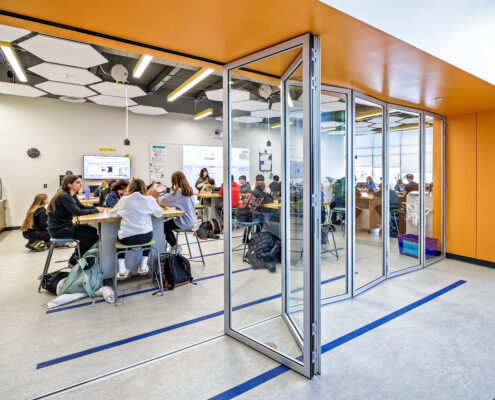 Middle School North: Classroom Lab Space Featuring Moveable Wall System. The wall system provides flexibility between closed or open sessions for experiments and collaboration.