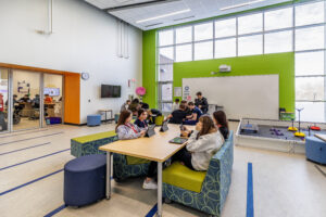 Middle School North: Learning Hub Space for Experiments & Collaboration. Note the robotics in the back right of the photo.